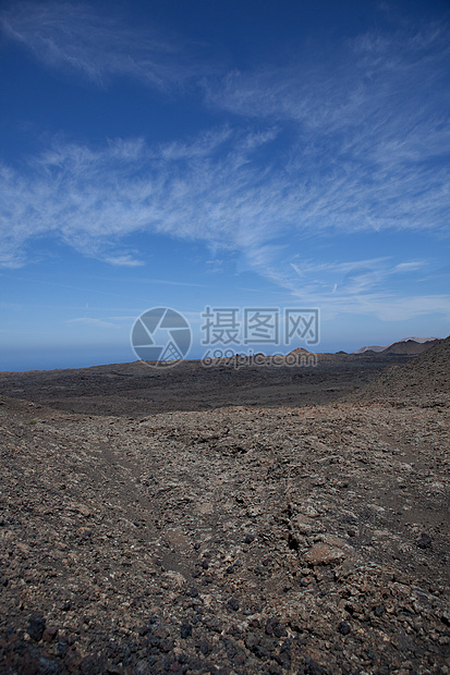 兰萨罗特的某个地方旅行日光阳光沙漠岩石目的地骨灰自然元素爬坡天空图片