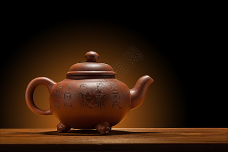 茶壶陶瓷设备木头食物象形仪式陶器桌子文化黏土图片