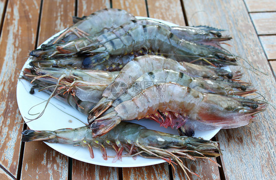 新鲜虾虾餐厅美食农民甲壳团体摊位海鲜触手红色尾巴图片