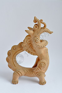 龙的形像婴儿乐趣白色神话雕像雕塑塑像黏土棕色玩具图片