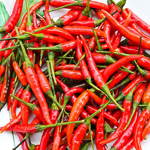 红辣椒红色胡椒团体白色宏观香料食物蔬菜墙纸背景图片