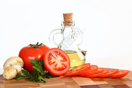 切割板上的产品烹饪木头食物香菜棕色切菜板厨房木板红色蔬菜图片