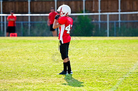 青年足球运动员白色孩子头盔四分卫童年乐趣运动学校防滑男生图片