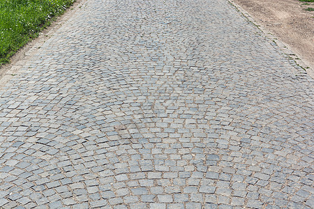 铺路建造立方体花岗岩小路路面条纹正方形黑色城市马赛克图片