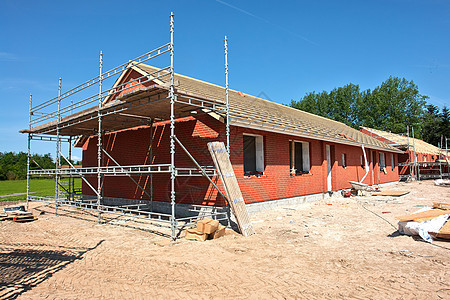 建造新住宅住房房屋建设房产建筑石头市场屋顶窗户建筑学脚手架工地石方图片