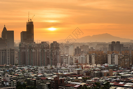 日落城市风景橙子首都旅行天空辉光天堂景观摩天大楼建筑住宅图片