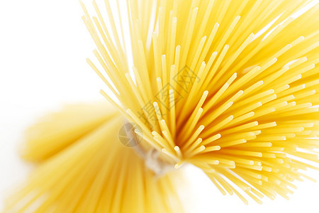 干意大利面杂货店烹饪食物绳索午餐黄色食品糖类白色用餐图片