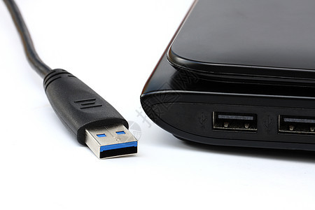 USB 隔离的USB电缆和白色背景的USB港USB笔记本数据硬件计算塑料导体渠道插头宏观界面电缆图片