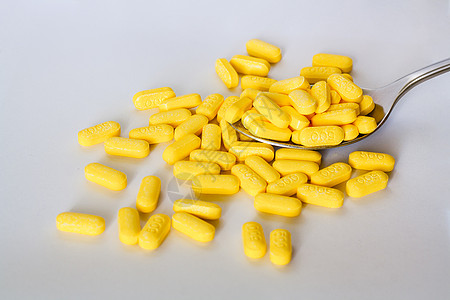 维生素C 500毫克黄色药品药片勺子辅食维生素橙子图片