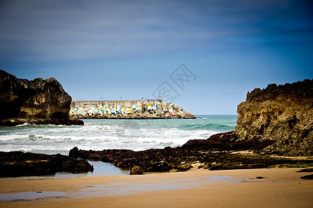 岩石海滩风景太阳晴天地平线沿海蓝色海洋海浪石头海岸图片