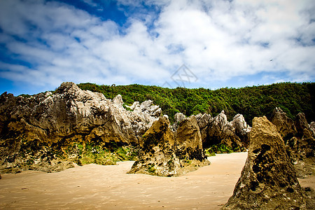 岩石海滩海景海洋海岸线支撑假期晴天天空地平线海浪风景图片