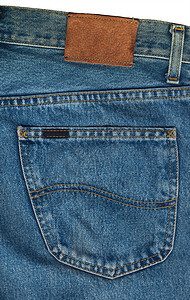 蓝色牛仔裤口袋特写棕色纤维衣服标签框架仔裤服饰接缝棉布裤子图片