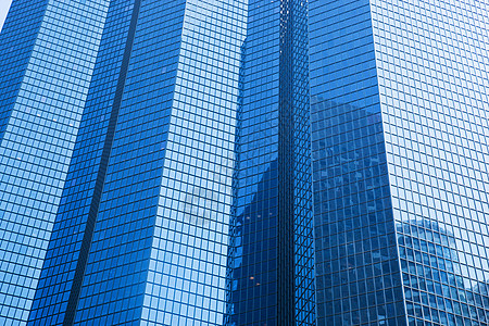 企业高楼商业摩天大楼的现代建筑是蓝色的背景