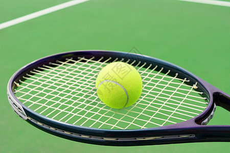 踢球打网球黄色石墨场地娱乐绿色法庭闲暇运动细绳活动图片
