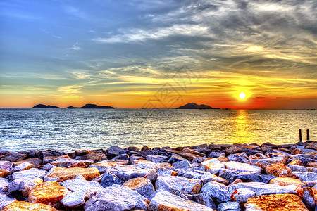 海面上美丽的日落海岸海景生态天气季节全景野生动物热带土地海洋图片