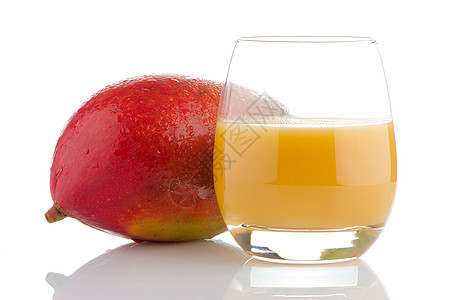 新鲜芒果汁热带水果奶油状黄色情调果味液体水壶果汁橙子图片