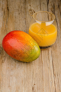 新鲜芒果汁甜点水果服务果汁液体奶油状水壶黄色橙子热带图片