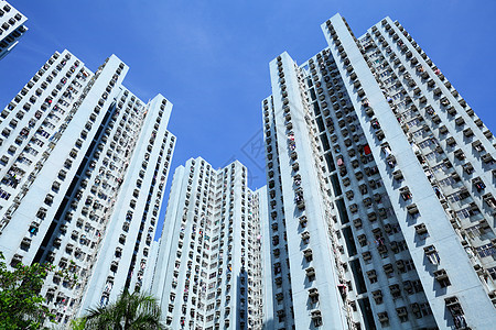 香港的公寓楼大楼绿色房子蓝色建筑天空住宅建筑学土地植物民众图片