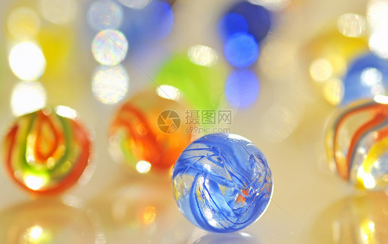玻璃球游戏玩具收藏家圆圈红色反思收藏品黄色千斤顶猫眼图片