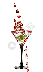 玛蒂尼格拉斯和一股玻璃绿色白色液体宏观饮料图片