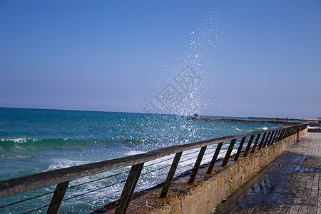 海沙滩海浪活力游泳旅行场景液体喷涂热带气候蓝色阳光图片