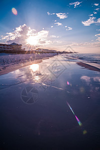 日出在阳光照耀的佛罗里达州上空海岸横梁假期晴天季节海岸线反射海滩天气太阳图片