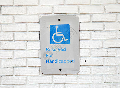 残疾人停车标志车轮蓝色街道轮椅椅子残障减值天空人士病人图片