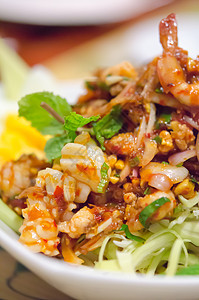 辣辣海鲜沙拉白色蔬菜沙拉绿色猪肉海鲜红色食物盘子图片