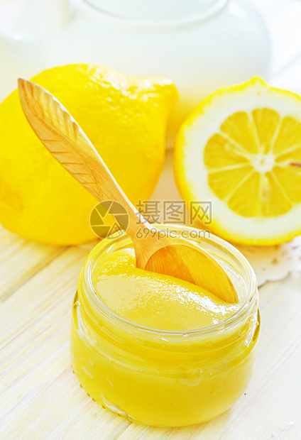 蜂蜜和柠檬小麦产品蜂窝寒意宏观营养木头食物玻璃甘菊图片