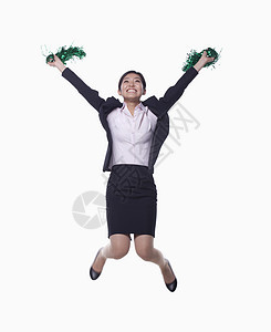 女商务人士跳跃和欢呼乐趣快乐套装商务队长幸福女性手臂长发微笑图片