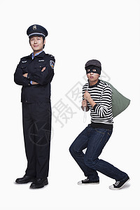 警察和小偷安全警官隐藏帽子法律影棚逮捕刑事制服摄影图片
