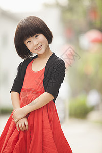 中国北京的穿红衣少女肖像图片