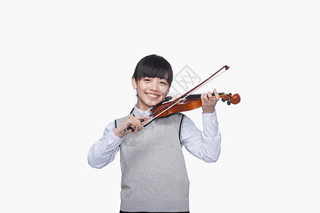 女孩拉小提琴音乐家裙子享受休闲古典音乐爱好幸福艺术棕色活动图片