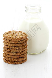新鲜牛奶和燕麦饼干传统豆浆麦片糕点坚果食物瓶子早餐乳糖奶制品图片