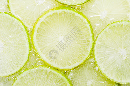 柠檬切片绿色宏观白色水果图片