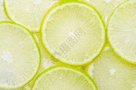 柠檬切片绿色宏观水果白色图片