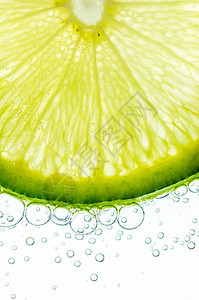 柠檬切片绿色水果宏观白色图片