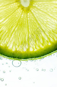 柠檬切片白色绿色宏观水果图片