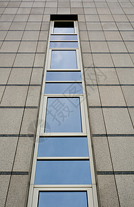 现代办公楼房子玻璃建筑办公室天空商业背景图片