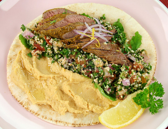 中东羊肉饼面包营养午餐用餐青菜烹饪草药味道美食柠檬香菜图片
