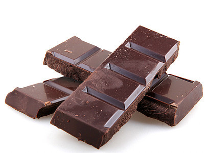 黑巧克力棒糖果条小吃宏观甜点棕色糖果牛奶食物白色碳水图片
