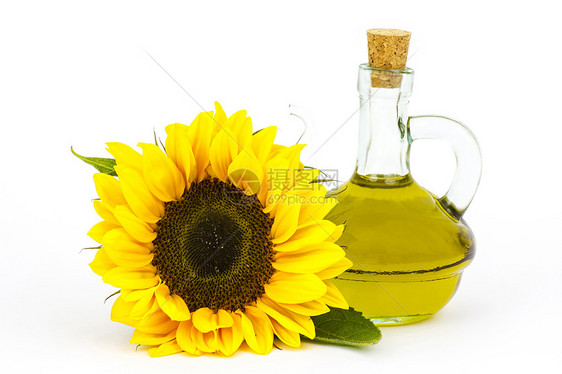 装有向日葵花油和向日葵的玻璃瓶图片