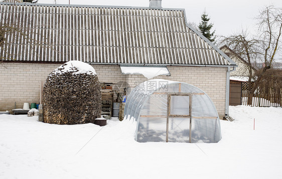 温冬温室寒雪 木柴图片