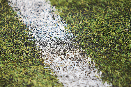 足球场一线白色足球角落运动游戏地形场地沥青绿色条纹背景图片