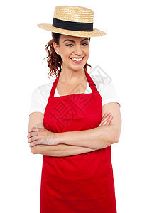 身戴草头保龄球帽的年轻面包师女青年面包餐饮双臂帽子工作商业厨房职业服务厨师图片