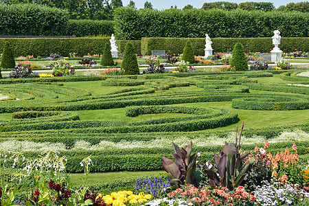 德国汉诺威的花园中带有雕塑的花园文化历史花坛雕像植物群旅行大理石庄园娱乐风格图片