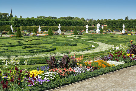德国汉诺威的花园中带有雕塑的花园花坛雕像文化树篱植物群树叶庄园旅游建筑学大理石图片