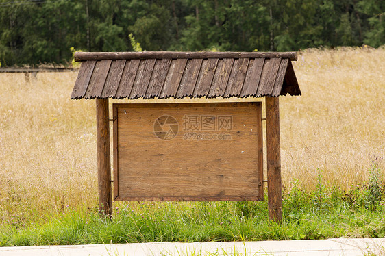 Wooden 消息板  您文本的空位公告招牌注意事项框架空白木头展示棕色木板图片