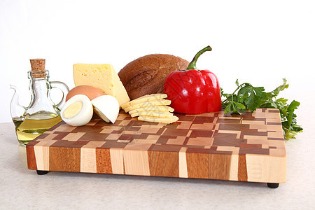 切割板上的产品香菜厨房木头红色菜板食物棕色蔬菜木板面包图片