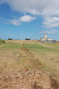 地震后灯塔的废墟建筑天空建筑物安全太阳外观框架旅行蓝色世界图片